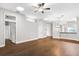 Open living area with wood-look floors, high ceilings and lots of natural light at 1117 Athlone Way, Ormond Beach, FL 32174