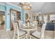 Charming dining area with a round table and chairs, offering open space at 450 W Delaware Ave, Lake Helen, FL 32744