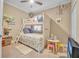 bedroom with bunk bed, play kitchen, and toys at 450 W Delaware Ave, Lake Helen, FL 32744