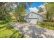 Long driveway with plenty of parking space at 450 W Delaware Ave, Lake Helen, FL 32744
