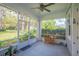 Bright and airy screened porch, great for relaxing at 450 W Delaware Ave, Lake Helen, FL 32744