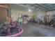 Two-car garage with lots of storage for bikes and tools at 450 W Delaware Ave, Lake Helen, FL 32744