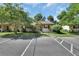 Front view of a house with parking spaces at 13 Villa Villar # 0, Deland, FL 32724