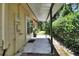 Covered back patio with access to the backyard at 13 Villa Villar # 0, Deland, FL 32724