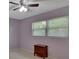 Spacious bedroom with ceiling fan and window blinds at 13 Villa Villar # 0, Deland, FL 32724