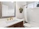 Bathroom with tub, shower, and updated vanity at 1117 Athlone Way, Ormond Beach, FL 32174