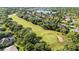 Community overview featuring a golf course and lake at 1117 Athlone Way, Ormond Beach, FL 32174