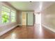 Spacious bedroom featuring hardwood floors and ample closet space at 724 N Oleander Ave, Daytona Beach, FL 32118