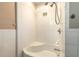 Simple bathroom with a shower/tub combo and white tile at 724 N Oleander Ave, Daytona Beach, FL 32118