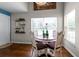 Cozy breakfast nook with a round table and chairs at 1401 Bent Oaks Blvd, Deland, FL 32724