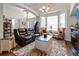 Spacious living room with comfortable seating and hardwood floors at 1401 Bent Oaks Blvd, Deland, FL 32724