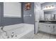Bathroom with a large soaking tub and separate shower at 1401 Bent Oaks Blvd, Deland, FL 32724