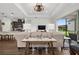 Open concept kitchen and living area, featuring modern appliances and a cozy seating arrangement at 6287 Woodhaven Village Dr, Port Orange, FL 32128
