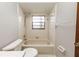 Clean bathroom with shower/tub combo and neutral tile at 34 Fairway Dr # 1, Debary, FL 32713