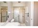 Bathroom featuring a shower and tub with grab bars at 34 Fairway Dr # 1, Debary, FL 32713