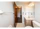 Bathroom with vanity, toilet and access to another room at 34 Fairway Dr # 1, Debary, FL 32713