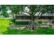 View of the home's exterior and landscaping at 34 Fairway Dr # 1, Debary, FL 32713
