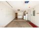 Garage with washer, dryer, and ample storage at 34 Fairway Dr # 1, Debary, FL 32713
