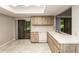 Kitchen with wood cabinets, white countertops, and stainless steel appliances at 34 Fairway Dr # 1, Debary, FL 32713