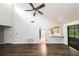 Spacious living area with high ceilings and wood floors at 34 Fairway Dr # 1, Debary, FL 32713
