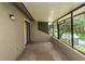 Relaxing screened-in porch overlooking a tranquil lake at 34 Fairway Dr # 1, Debary, FL 32713