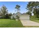 Cute one-story home with attached garage and grassy yard at 1790 17Th St, Orange City, FL 32763