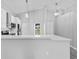 Modern kitchen with white cabinets and quartz countertops at 1790 17Th St, Orange City, FL 32763