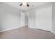 Bedroom with tile floors, double door closet and an additional door at 1790 17Th St, Orange City, FL 32763