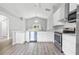 Modern kitchen with stainless steel appliances and white cabinets at 1790 17Th St, Orange City, FL 32763