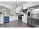 Modern kitchen that features stainless steel appliances and white cabinets at 1790 17Th St, Orange City, FL 32763