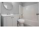 Clean bathroom with white vanity, toilet, and shower/tub combo at 1790 17Th St, Orange City, FL 32763
