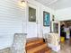 Exterior view of back porch with access to utility area at 824 Silver Oak Ave, The Villages, FL 32159