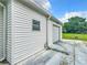 White vinyl-sided garage with single door at 824 Silver Oak Ave, The Villages, FL 32159