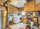 Laundry room with washer, dryer, and ample storage at 824 Silver Oak Ave, The Villages, FL 32159