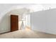 Bright bedroom with sloped ceilings, a dividing wall, and a large closet at 3660 Grand Ave, Deland, FL 32720