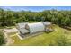 Unique home with a large covered patio and attached garage at 3660 Grand Ave, Deland, FL 32720