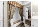 Bathroom with shower/tub combo, tile flooring and wood vanity at 3660 Grand Ave, Deland, FL 32720