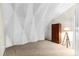 Unique bedroom with sloped ceilings and a wood wardrobe at 3660 Grand Ave, Deland, FL 32720