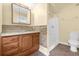 Clean bathroom with shower/tub combo and wood vanity at 3660 Grand Ave, Deland, FL 32720