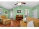 Bright living room with hardwood floors, vaulted ceilings and neutral color palette at 3457 Martingale Ct, Port Orange, FL 32129