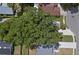Aerial view showing home's location, large tree, and neighborhood at 3457 Martingale Ct, Port Orange, FL 32129