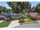 Quaint house exterior with green walls and garage at 3457 Martingale Ct, Port Orange, FL 32129