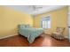 Bedroom with a queen bed and ceiling fan at 3457 Martingale Ct, Port Orange, FL 32129