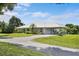 Image 1 of 57: 230 Violetwood Rd, Deland