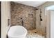 Spa-like bathroom with a soaking tub and walk-in shower at 288 Silverstone Dr, Orange City, FL 32763