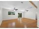 Bright living room featuring hardwood floors and ceiling fans at 288 Silverstone Dr, Orange City, FL 32763