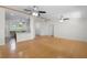 Expansive living area with hardwood floors and views into other rooms at 288 Silverstone Dr, Orange City, FL 32763