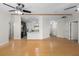 Large living room offering an open floor plan and hardwood floors at 288 Silverstone Dr, Orange City, FL 32763