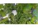 Aerial view showing house location and lot size near a pond at 288 Silverstone Dr, Orange City, FL 32763