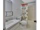 Bathroom with tub shower, toilet and vanity at 47 Villa Villar Ct # 470, Deland, FL 32724